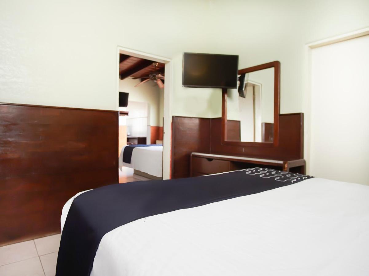 إنسينادا Capital O Hotel America المظهر الخارجي الصورة
